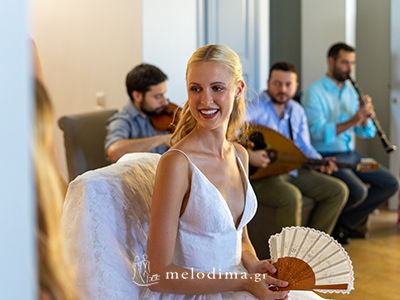 Greek-American & Estonian-model wedding with 12 artists in Spetses